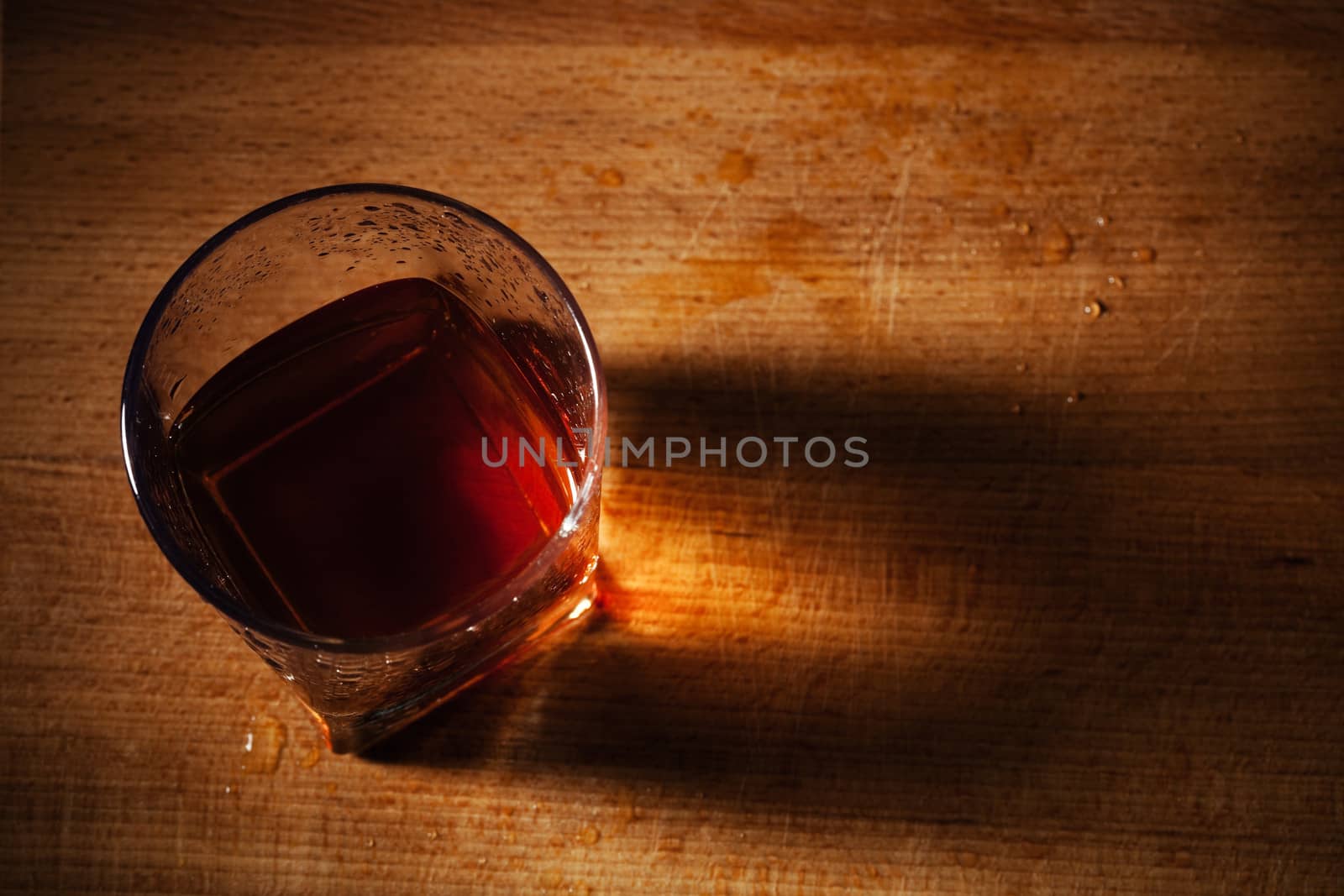 glass from whisky on a wooden table