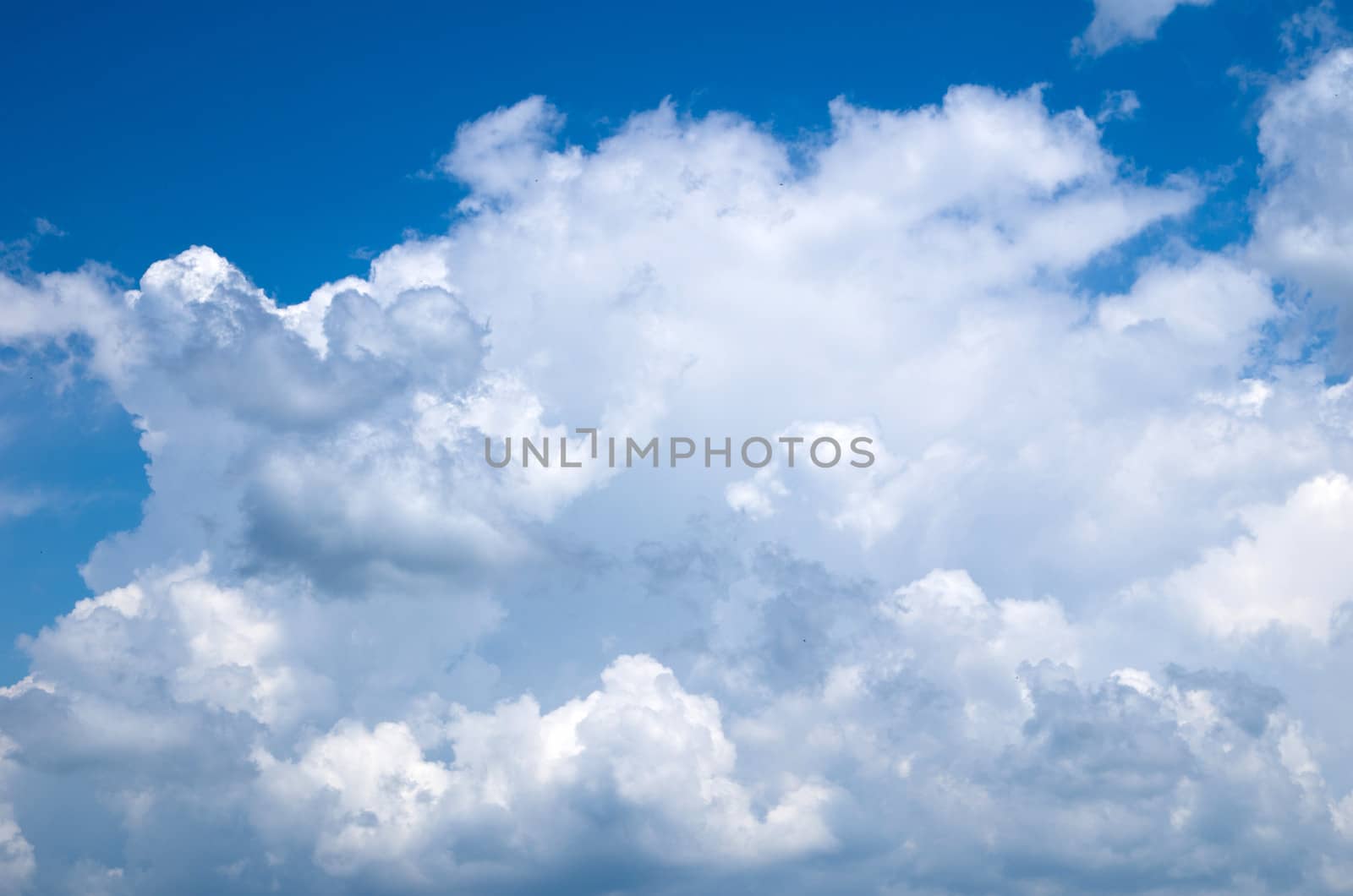 blue sky is covered by white clouds