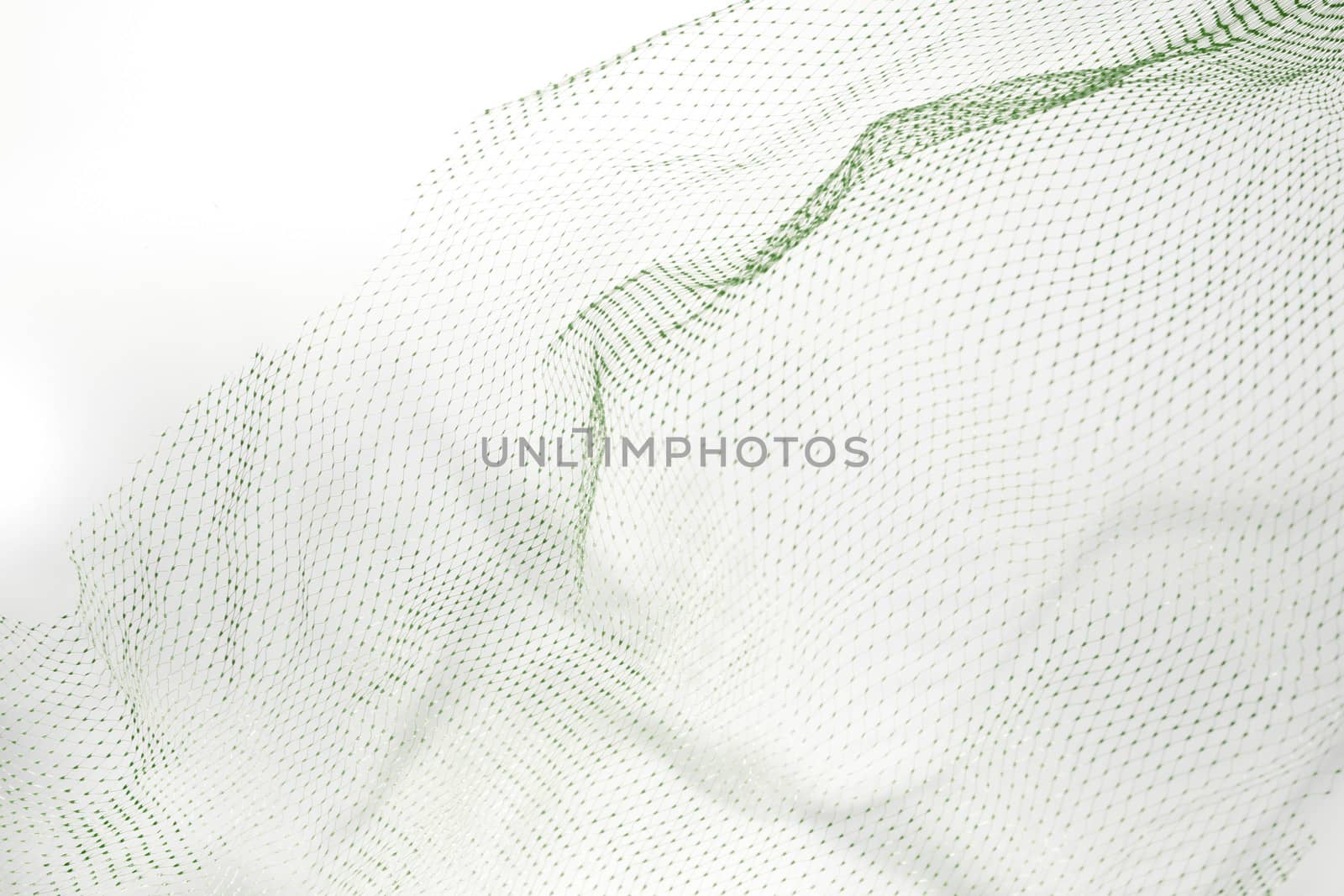 Closeup of abstract fishnet on white background.Green tone