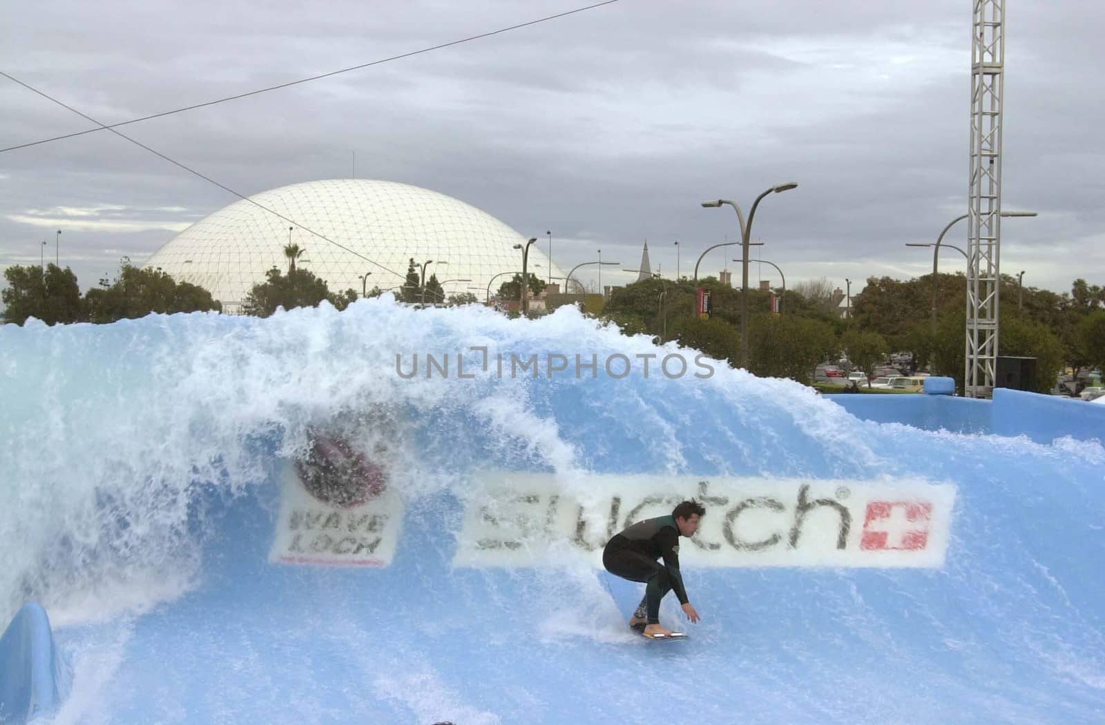 Surfer at the Swatch Wave Tour surf competition and rock concert at the Queen Mary in Long Beach, 02-02-00