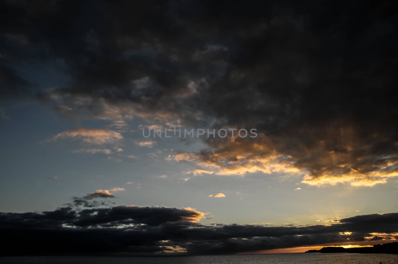 Cloudscape, Colored Clouds at Sunset near the Ocean