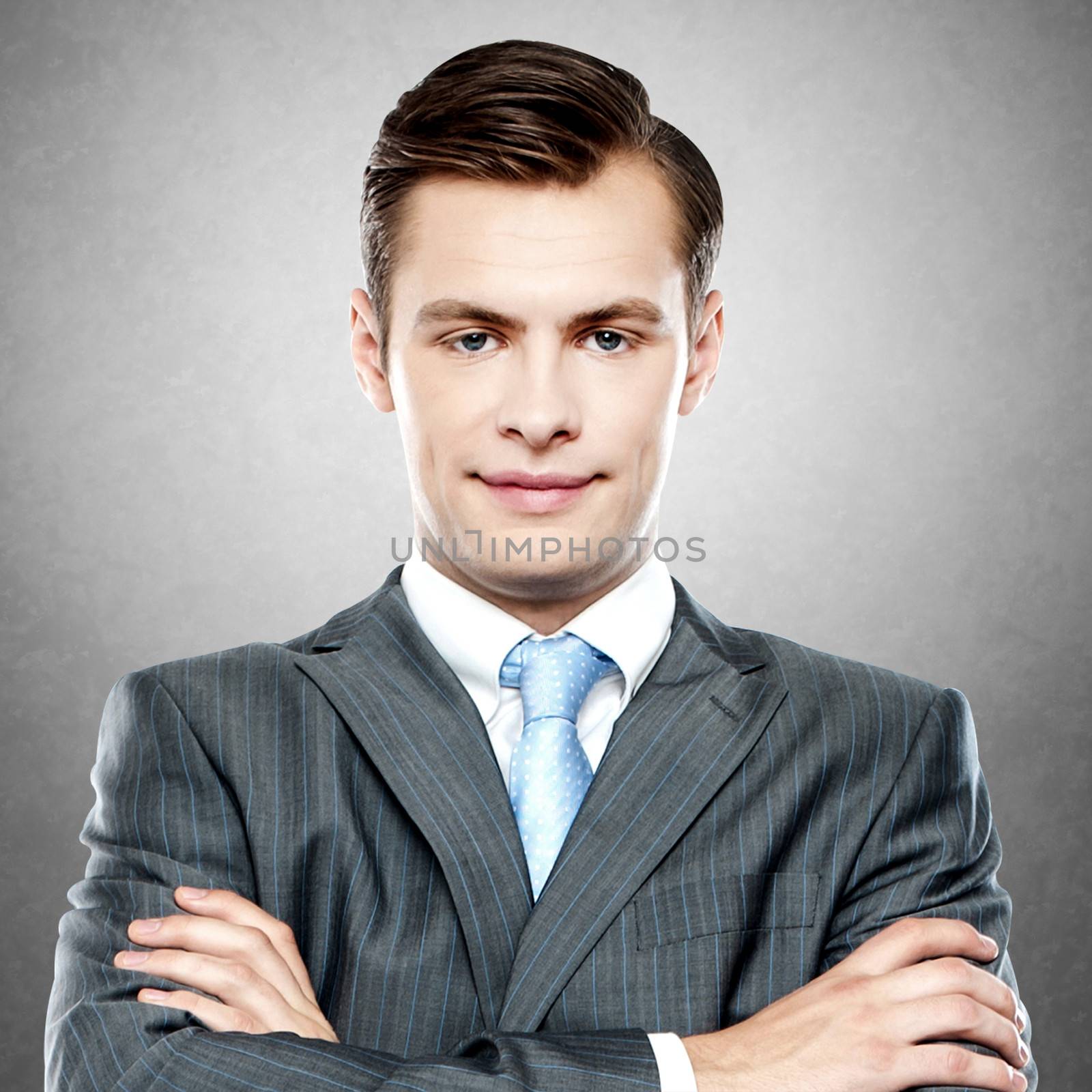 Businessman posing confidently by stockyimages