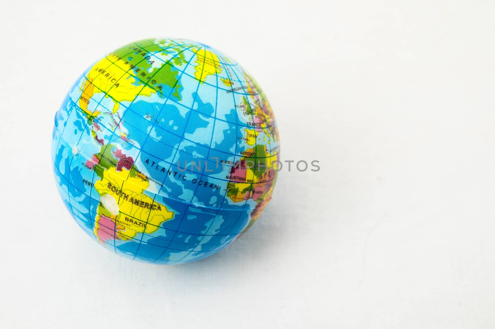 The World Globe Made of Rubber on a White Background