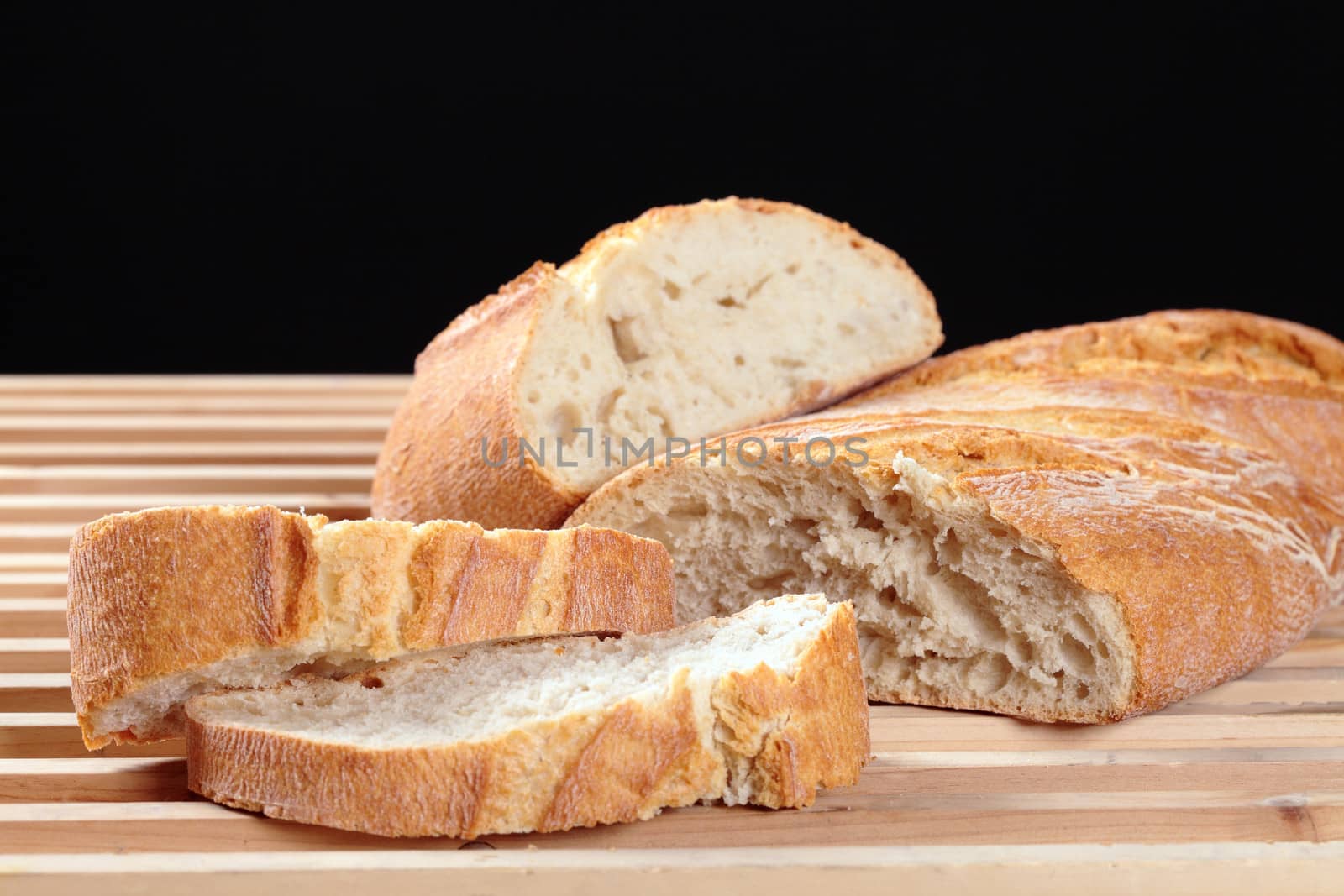 Bar Cut bread on a black background