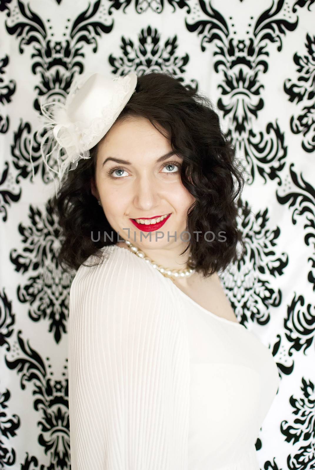 beautiful retro girl portrait in vintage style dress