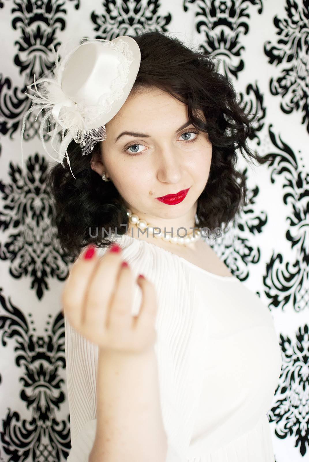 beautiful retro girl portrait in vintage style dress