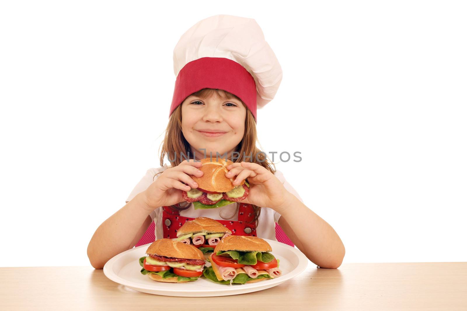 happy little girl cook eat sandwich 