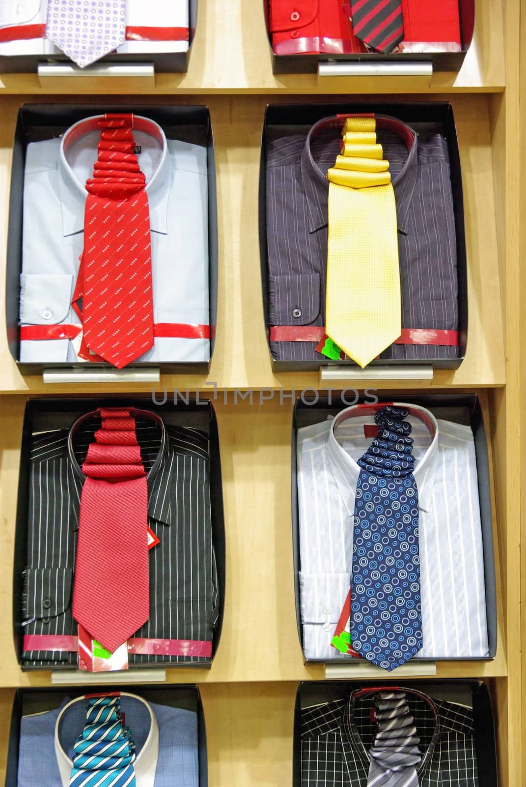 Colorful shirts with necktie in a shop.