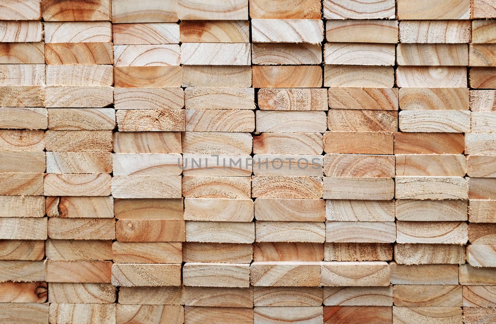 stack of square wood planks by photosoup