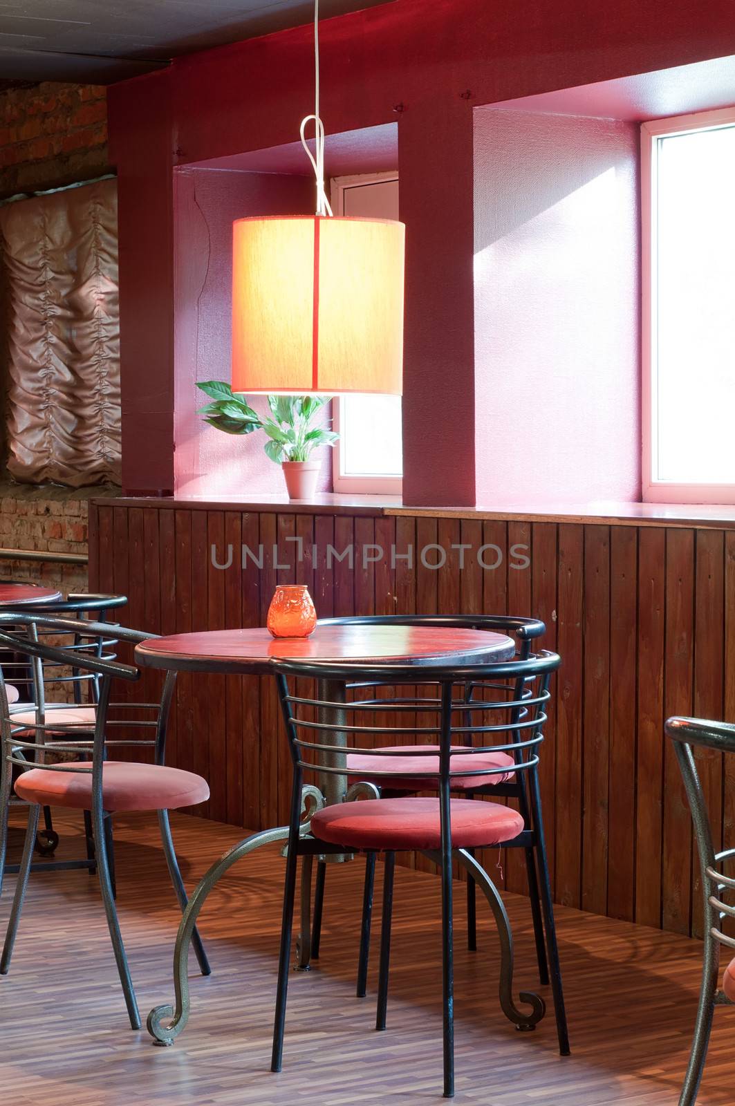 Shot of tables and chairs in billiard room