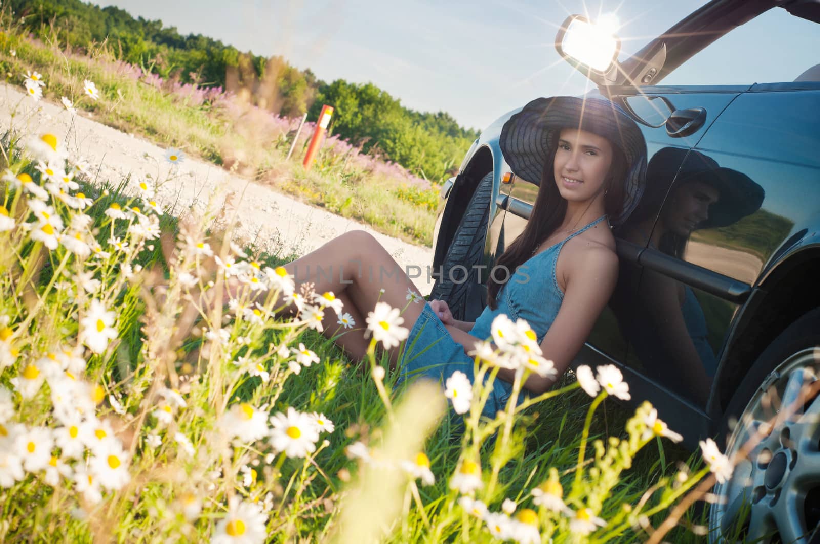 Outdoor shot of beautiful brunette woman with long hair