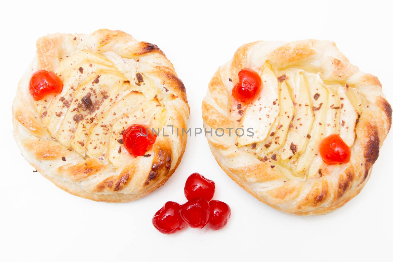 Puff pastry with apples on white background