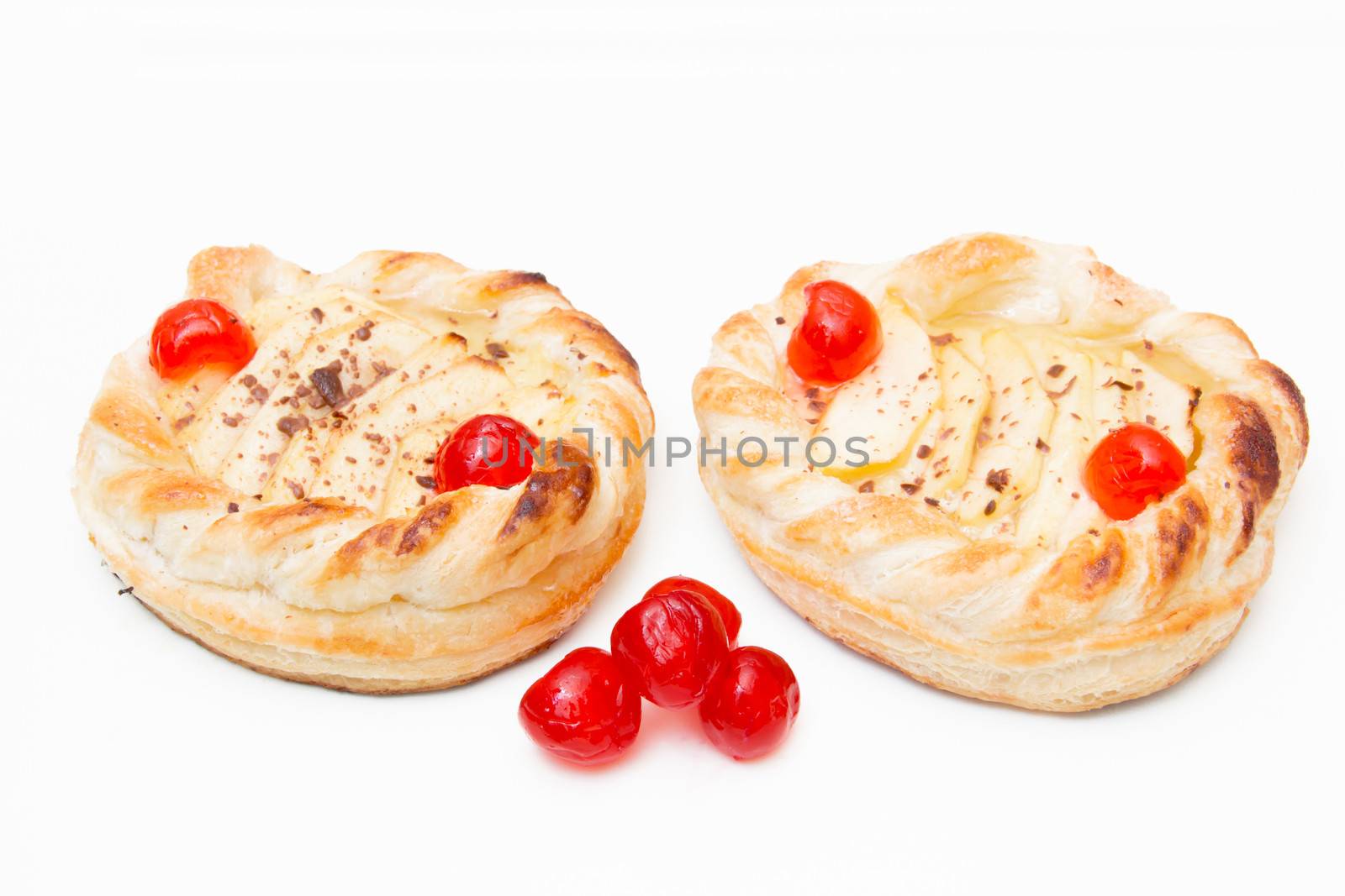 Puff pastry with apples on white background
