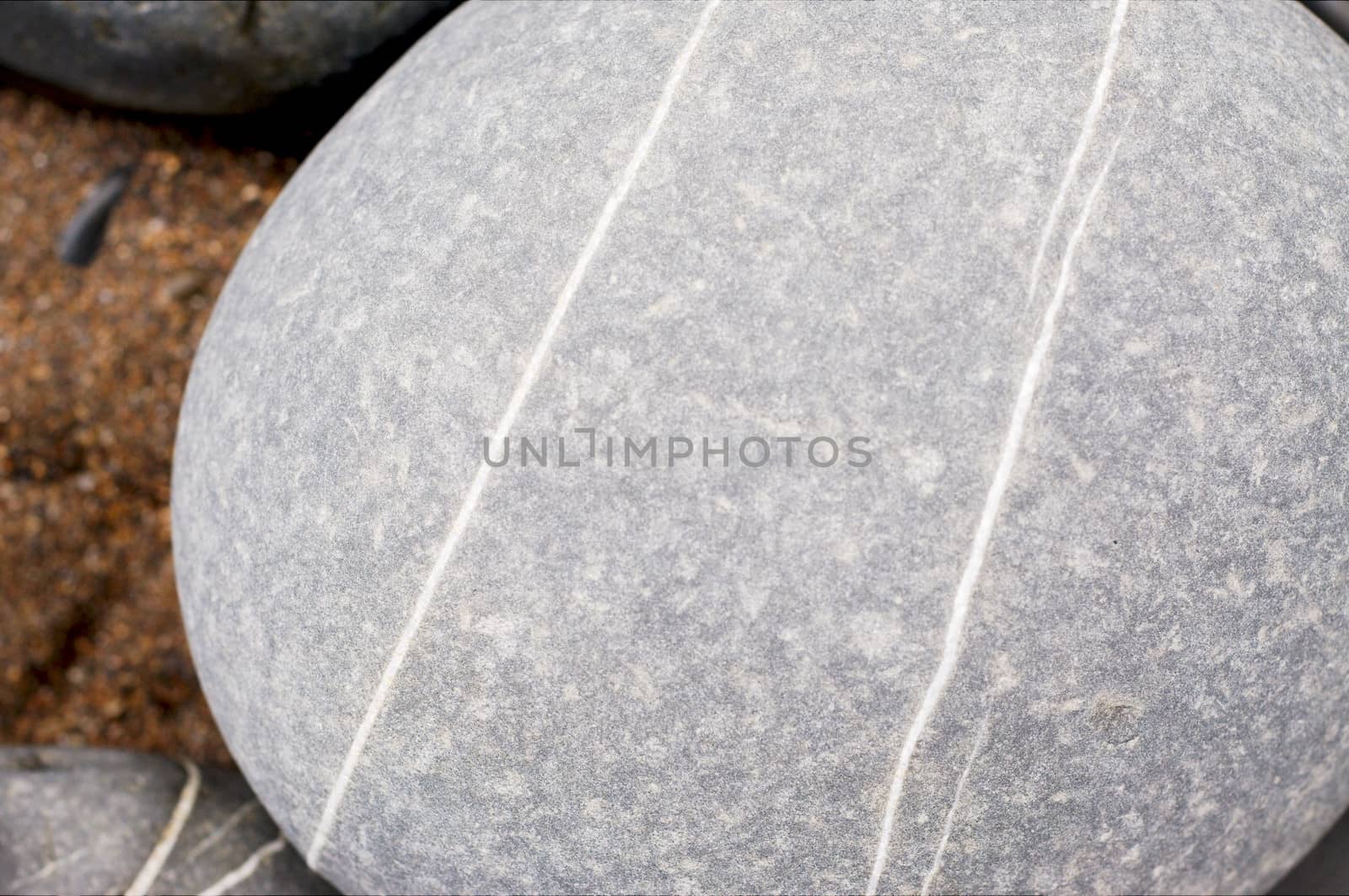 Stripped pebbles at a beach of Devon