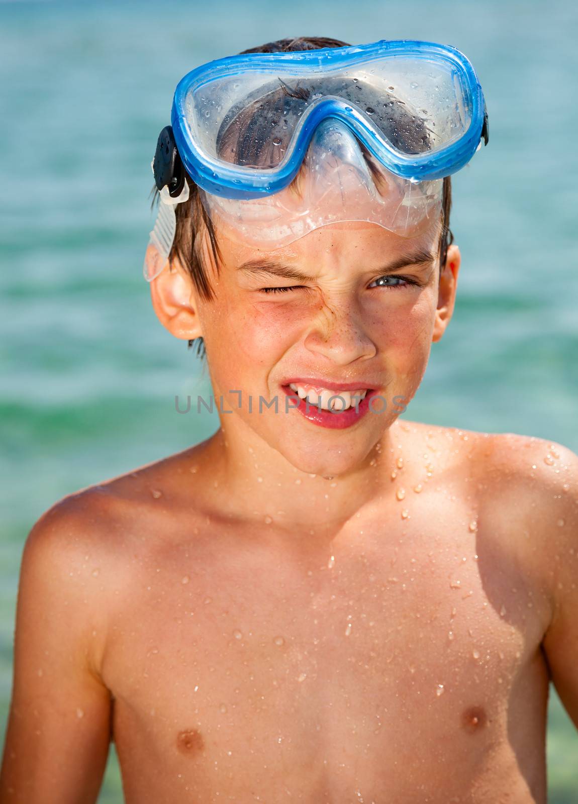 Kid with snorkeling mask portrait