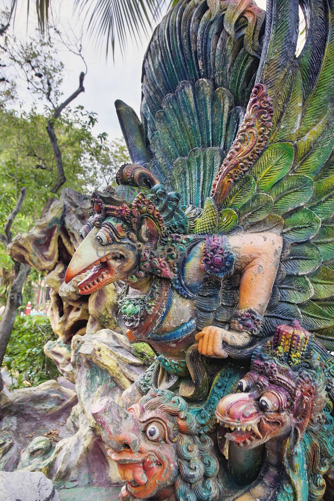 SINGAPORE - FEBRUARY 1, 2014: Garuda Hindu Statue at Haw Par Villa Theme Park. This theme park contains over 1,000 statues and 150 giant dioramas depicting scenes from Chinese mythology, folklore, legends, and history.