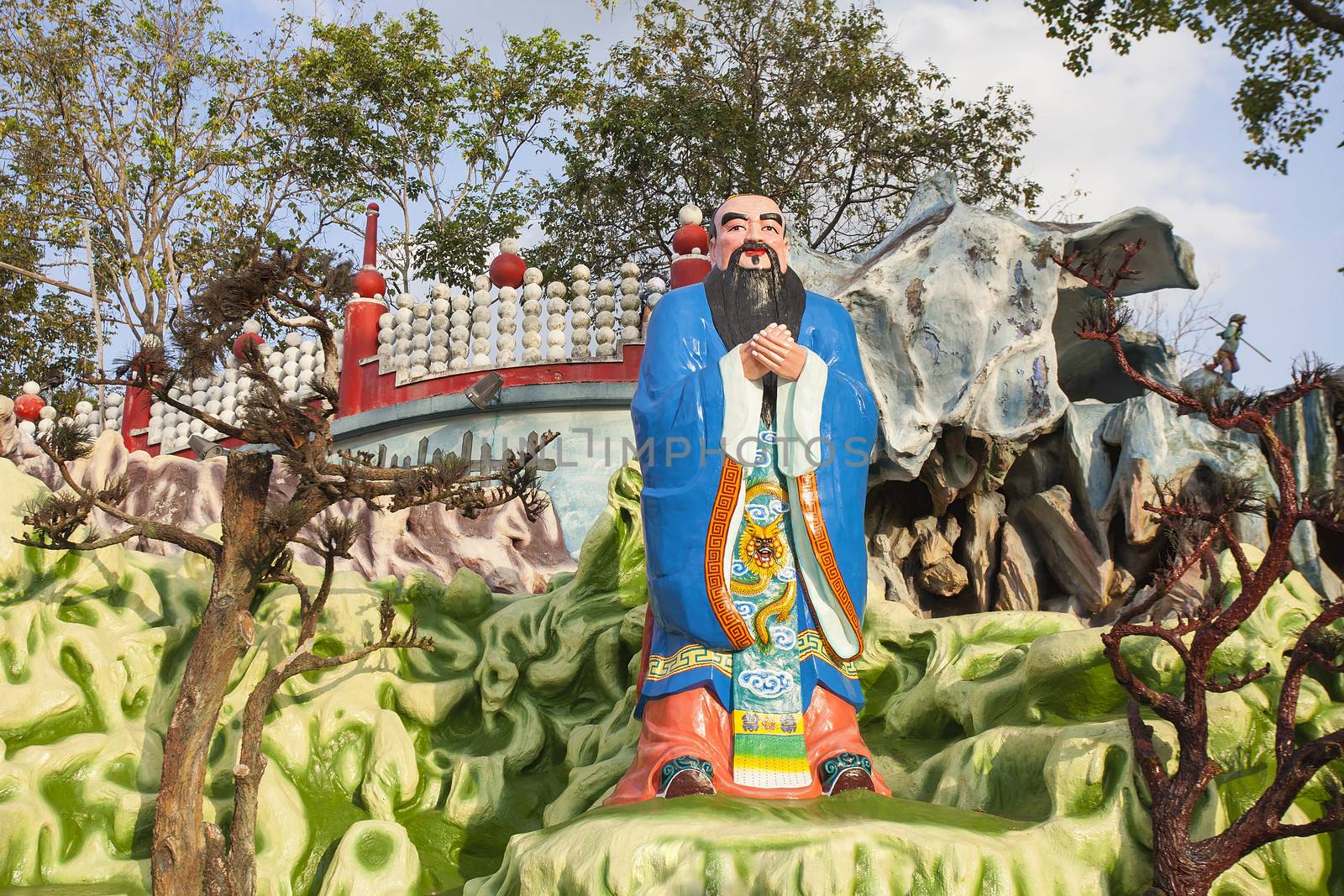 SINGAPORE - FEBRUARY 1, 2014: Chinese Scholar and Teacher Confucius Statue Diorama at Haw Par Villa Theme Park. This theme park contains over 1,000 statues and 150 giant dioramas depicting scenes from Chinese mythology, folklore, legends, and history.