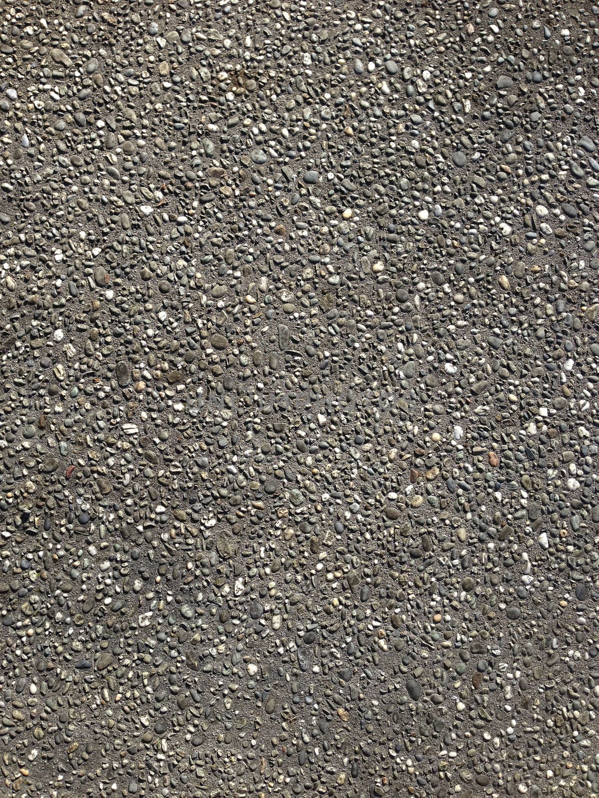 Closeup of textured pebbles background