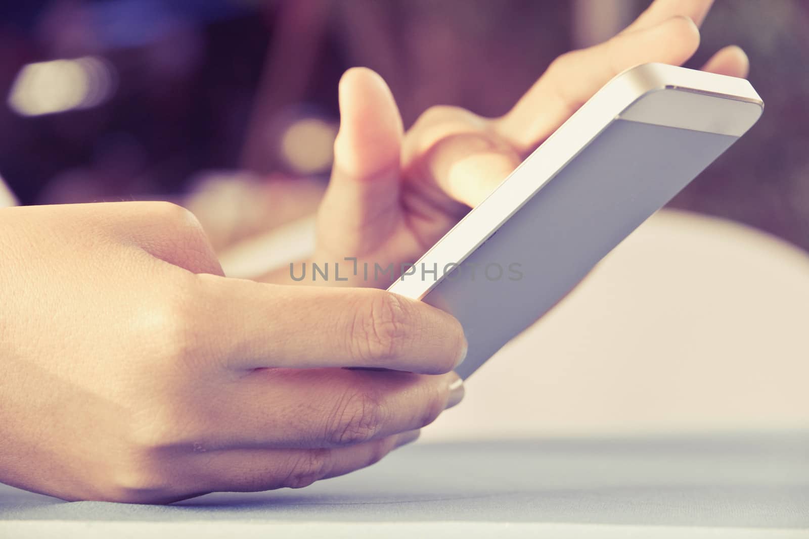 Teenage girl text messaging on her phone