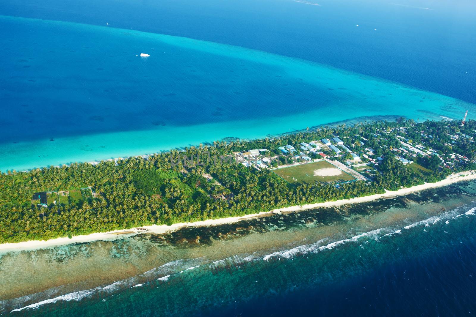 Group of atolls and islands in Maldives from aerial view