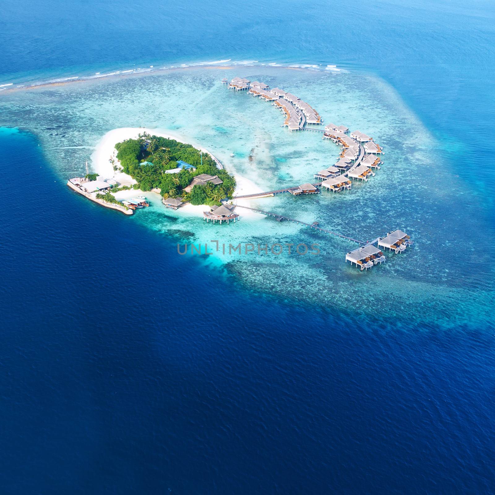 Group of atolls and islands in Maldives from aerial view