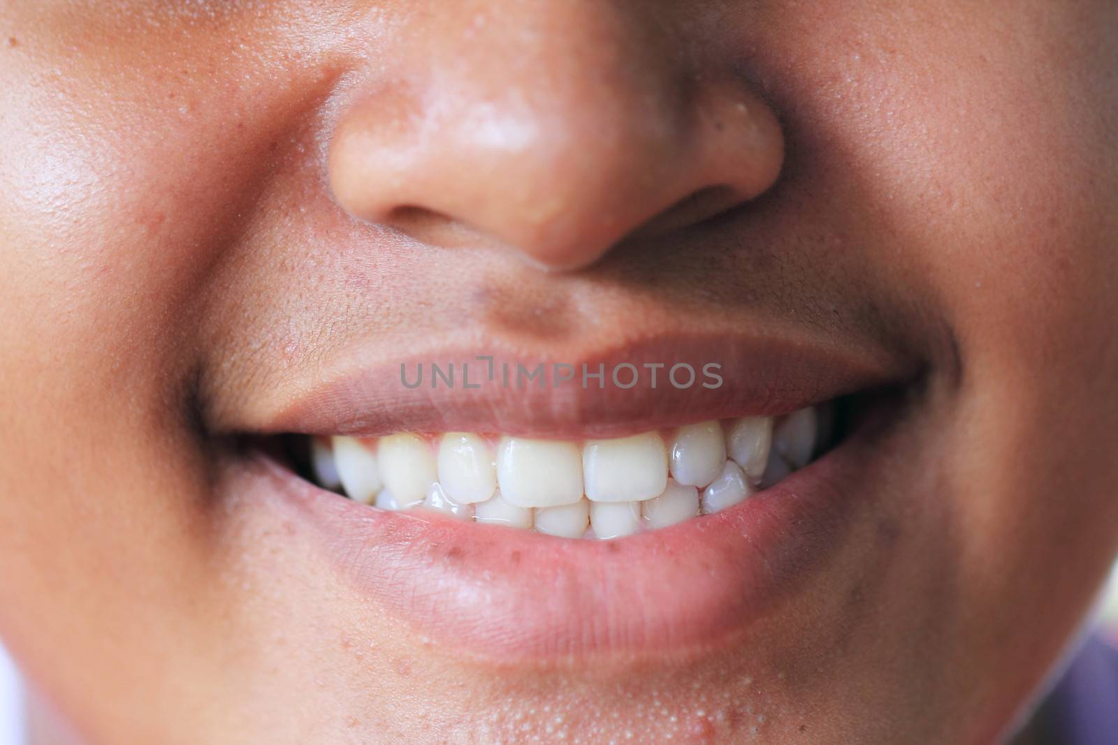 Close up of Thai man smiling 