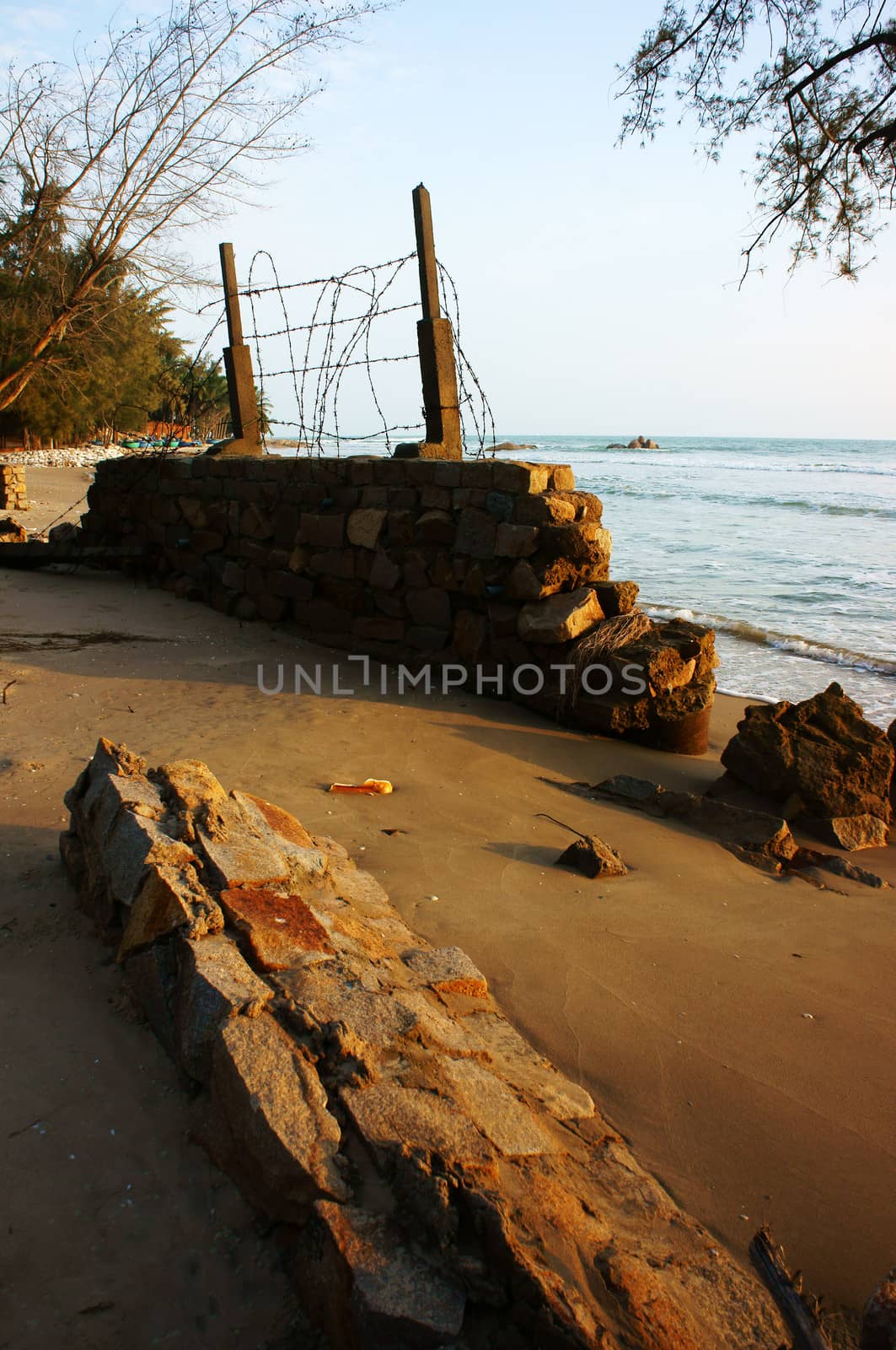 Erosion at seaside, wave destroy seawall, effect of climate change, this is global environment problem in future