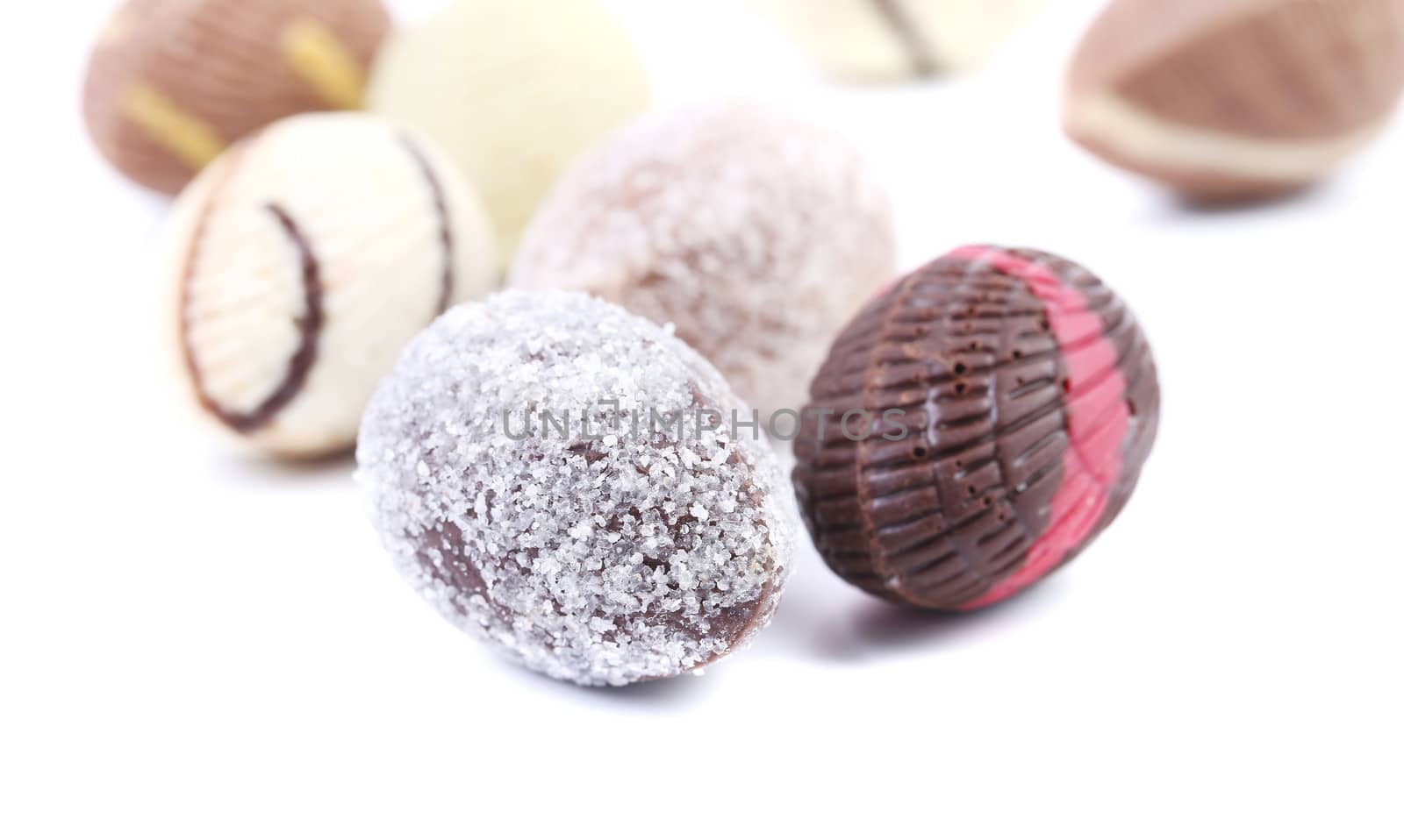 Chocolate seashells and stones. Isolated on a white background