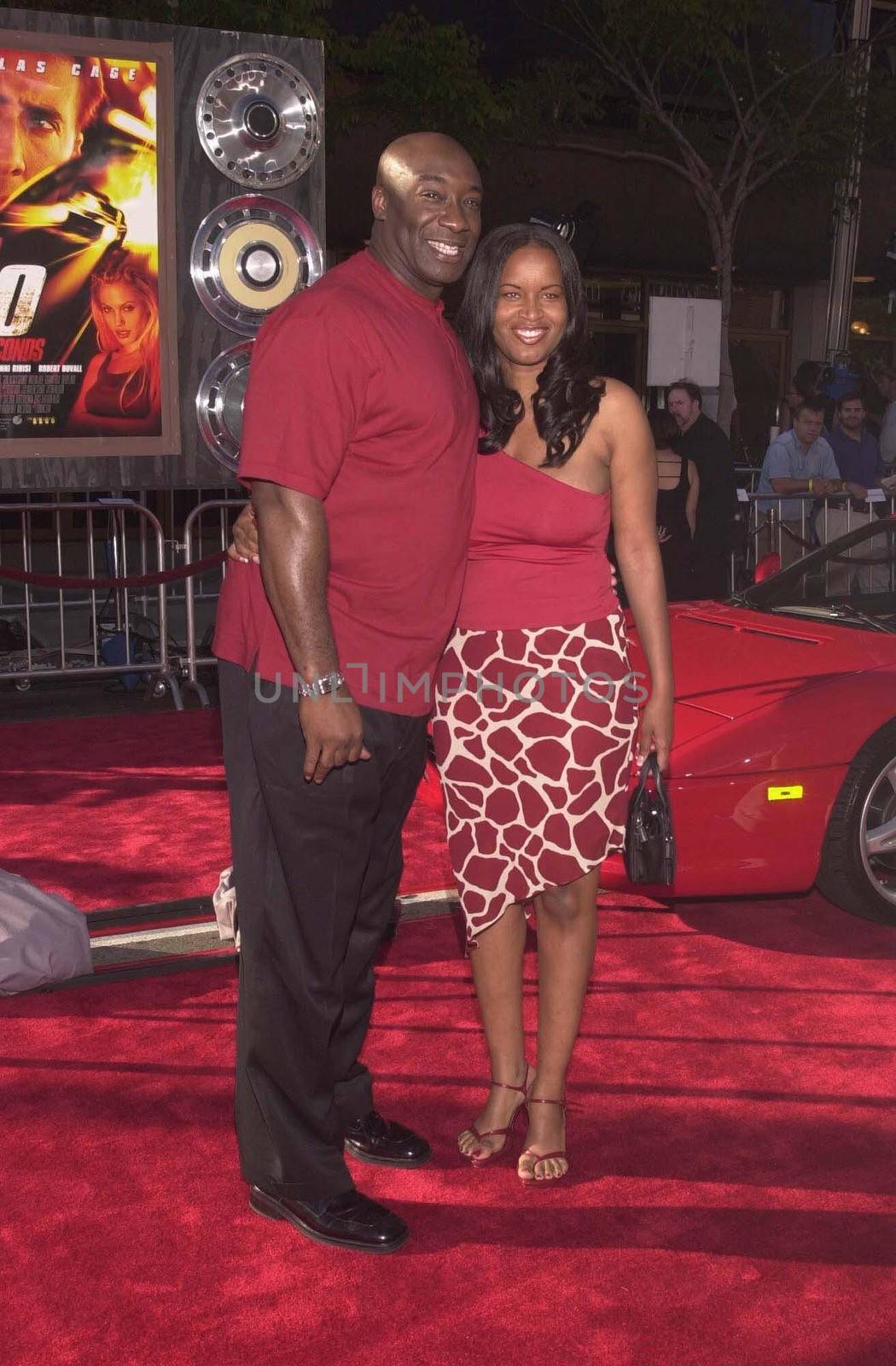 Michael Clarke Duncan and date at the premiere of Touchstone's GONE IN 60 SECONDS in Westwood, 06-05-00