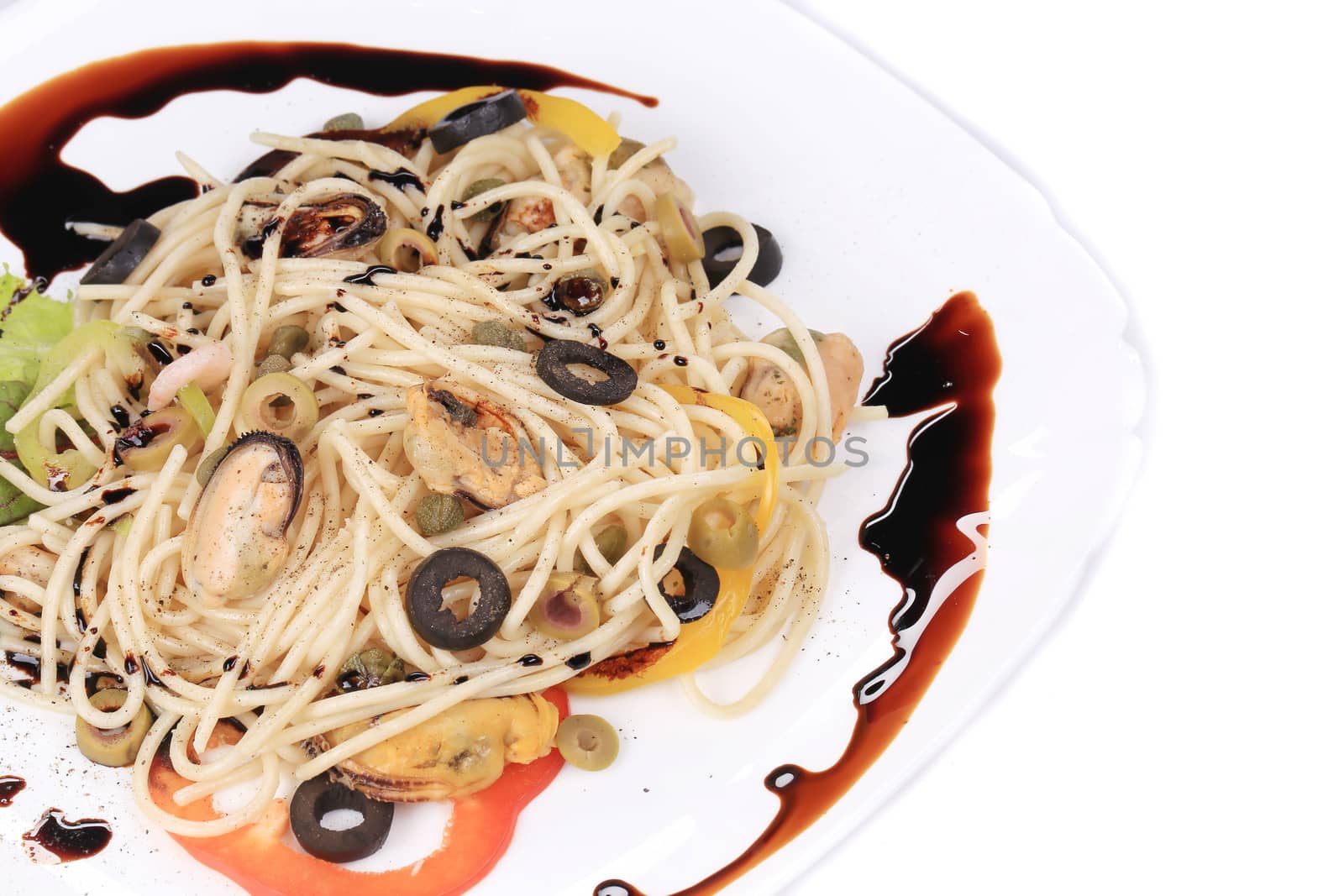 Sea salad with spaghetti. Isolated on a white background.