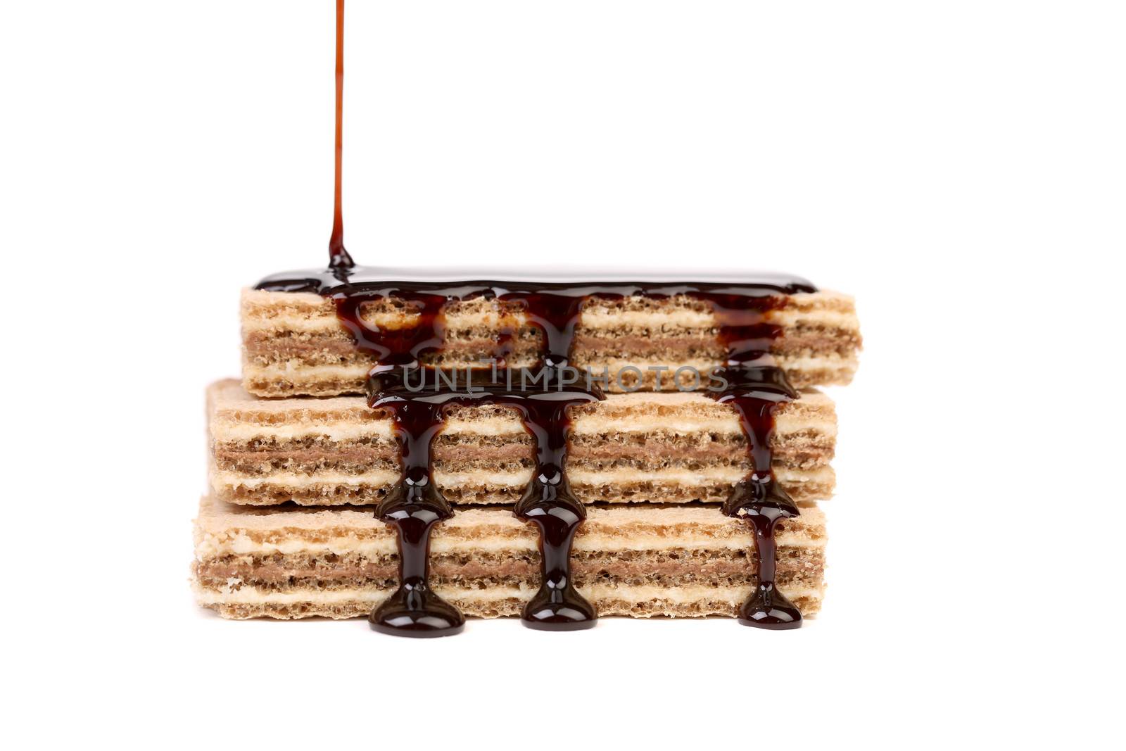 Coated stake wafers of chocolate. Isolated on a white background.