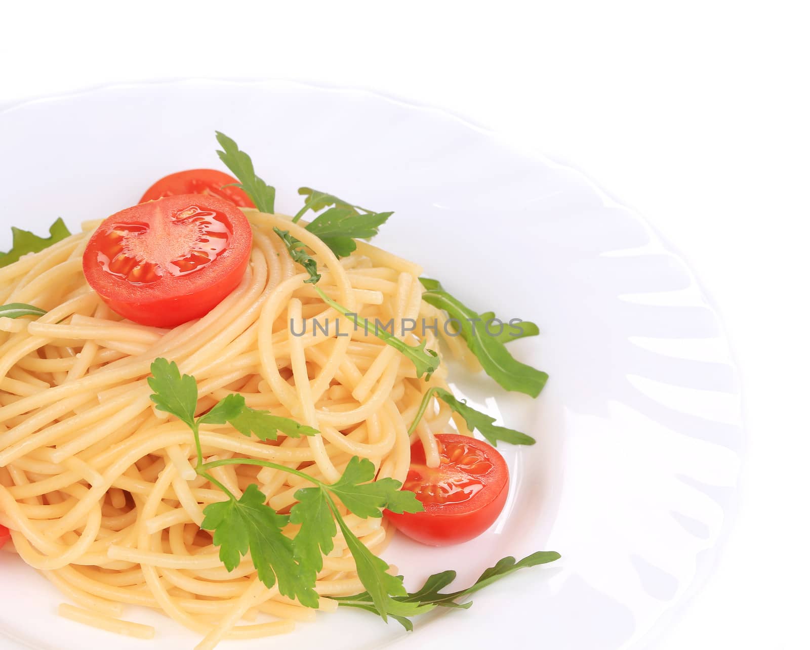 spaghetti with tomato and basil. isolated on a white background