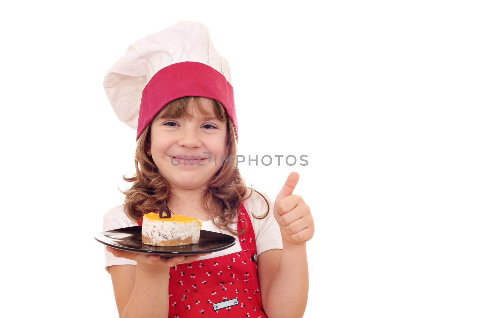 happy little girl cook with cake and thumb up by goce