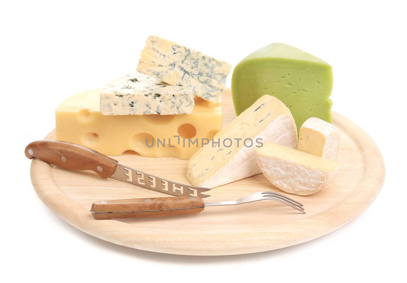 Cheeses on cutting board. Isolated o n awhite background.