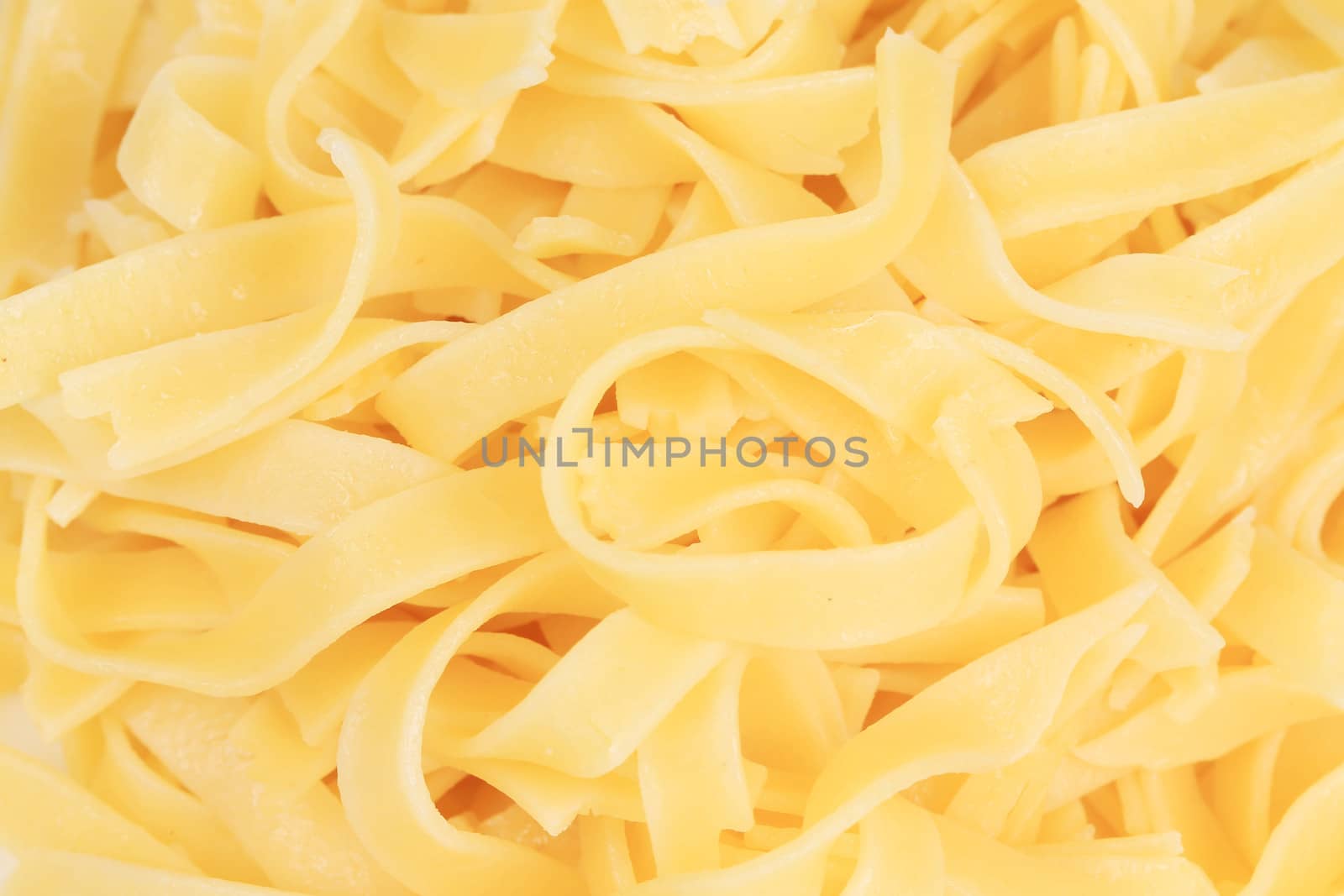 Tagliolini close up. Macro. A whole background.
