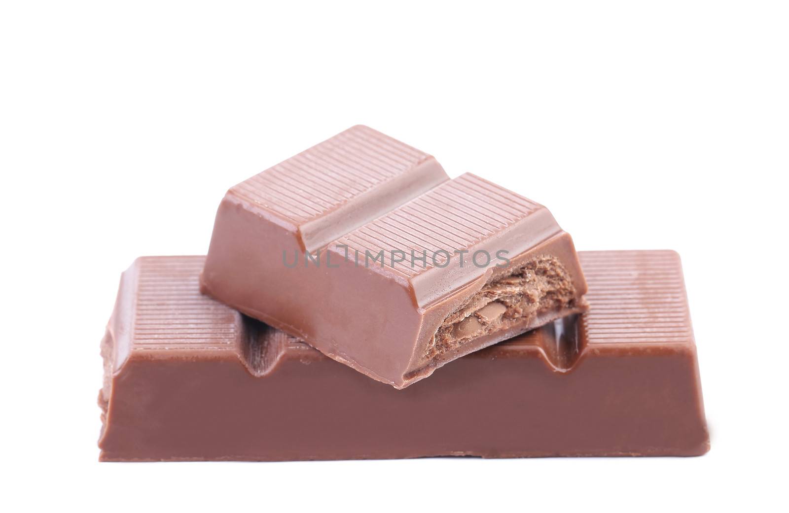 Bar of chocolate with a filling. Isolated on a white background