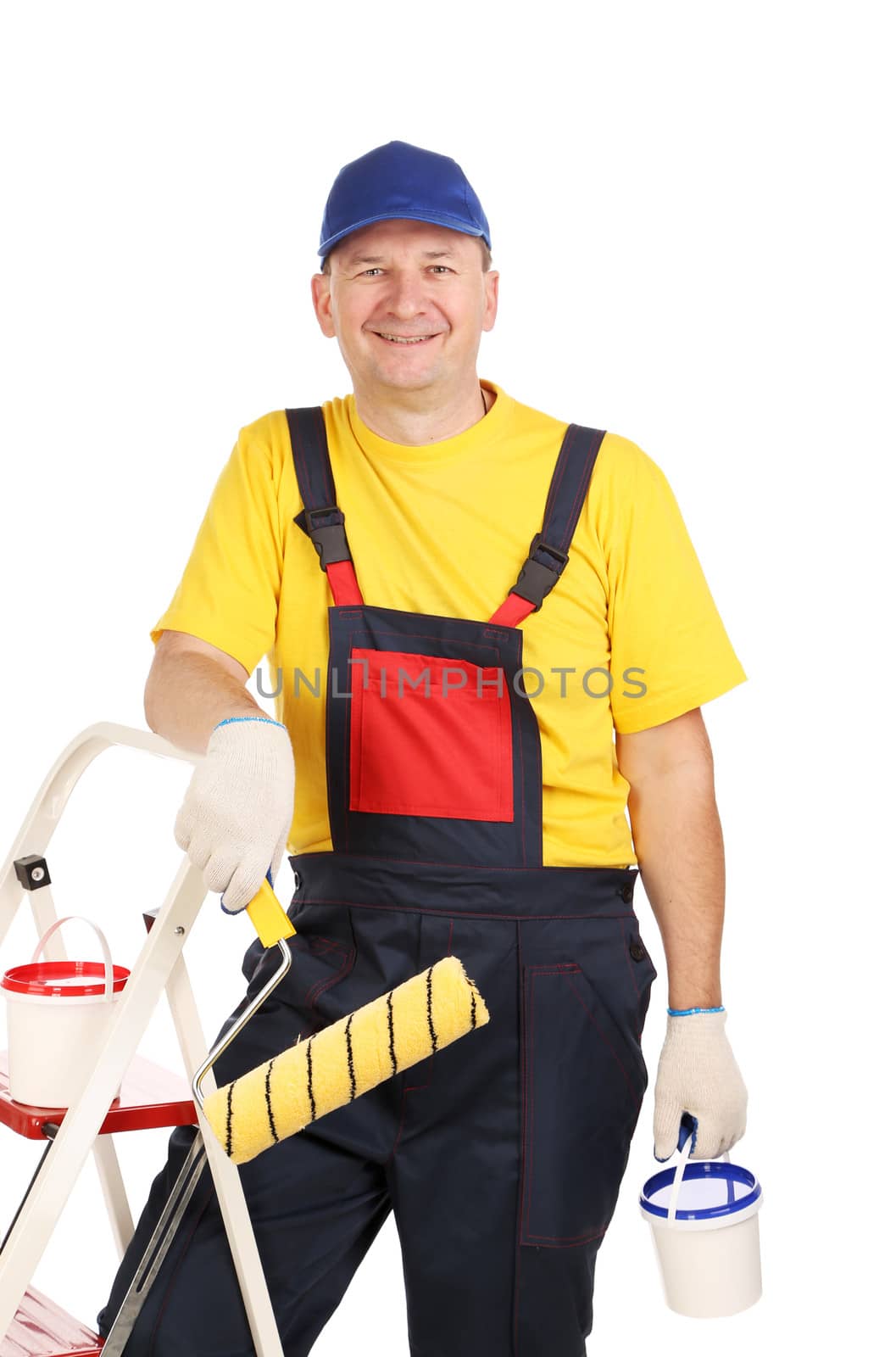 Smiling man in overall. Isolated on a white background.