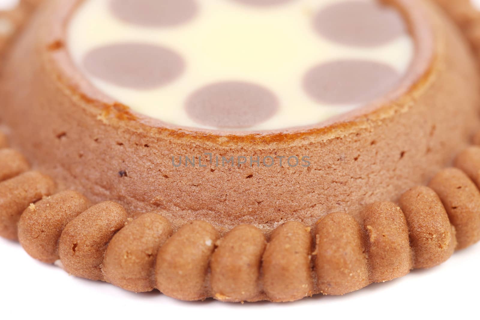 close up of brown chocolate biscuits with cream filling