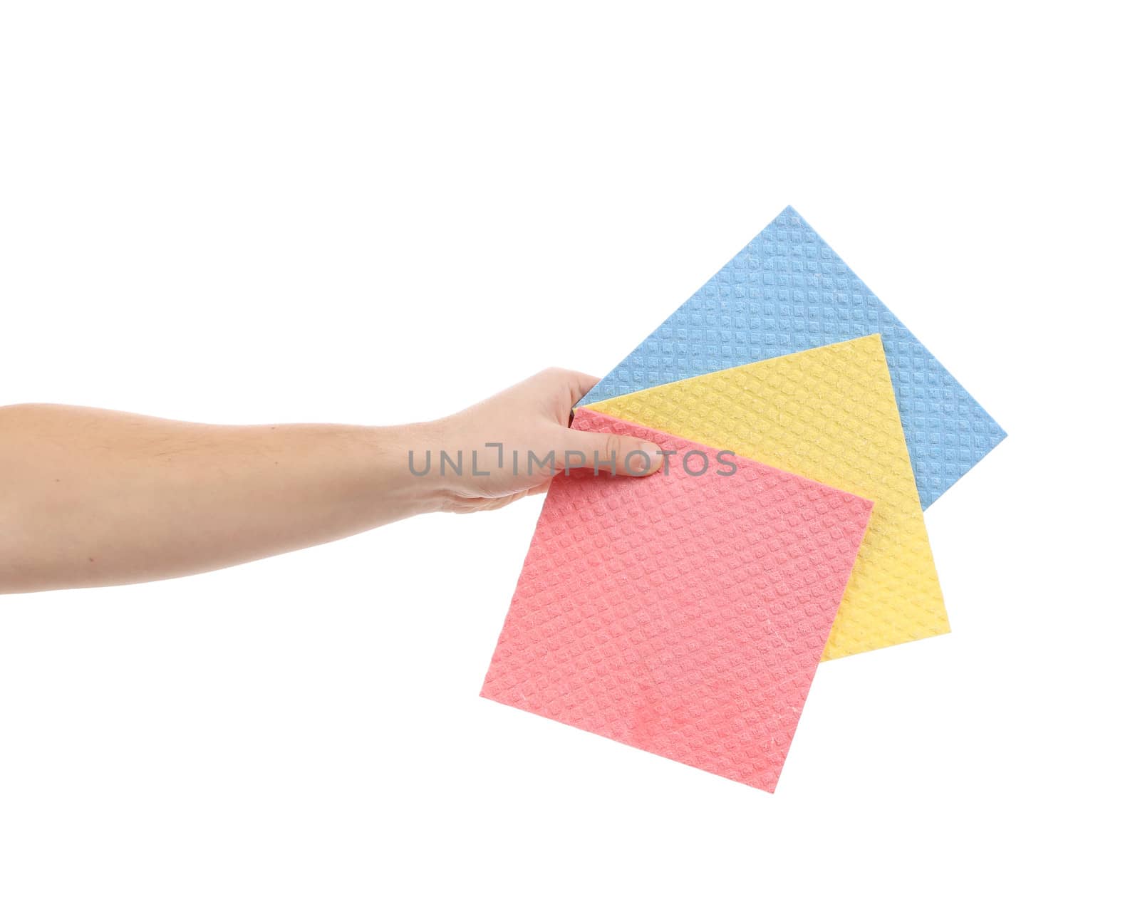 Hand with colourful sponges. Isolated on a white background.