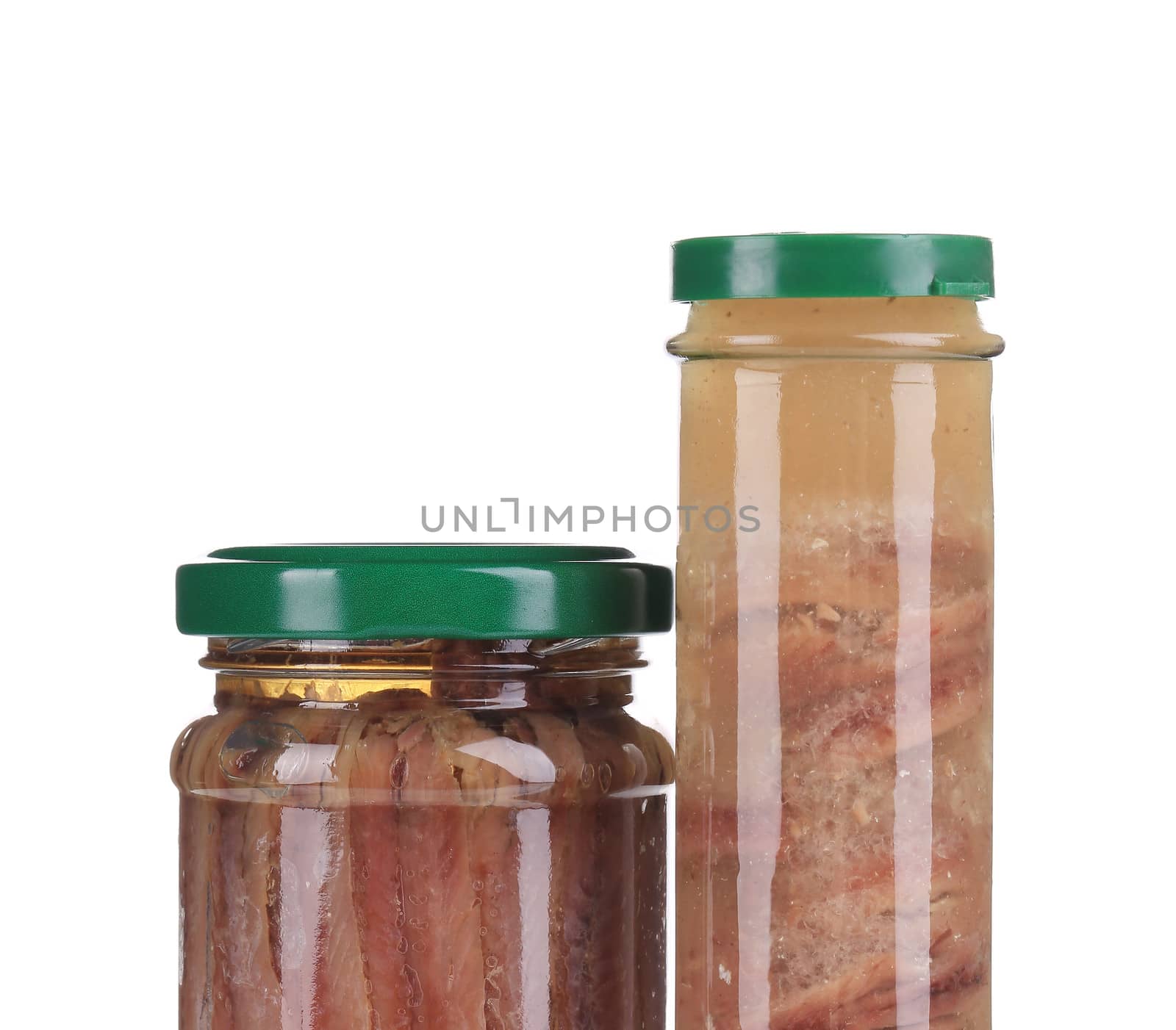 Jar of anchovy fillets. Close up. Whole background.