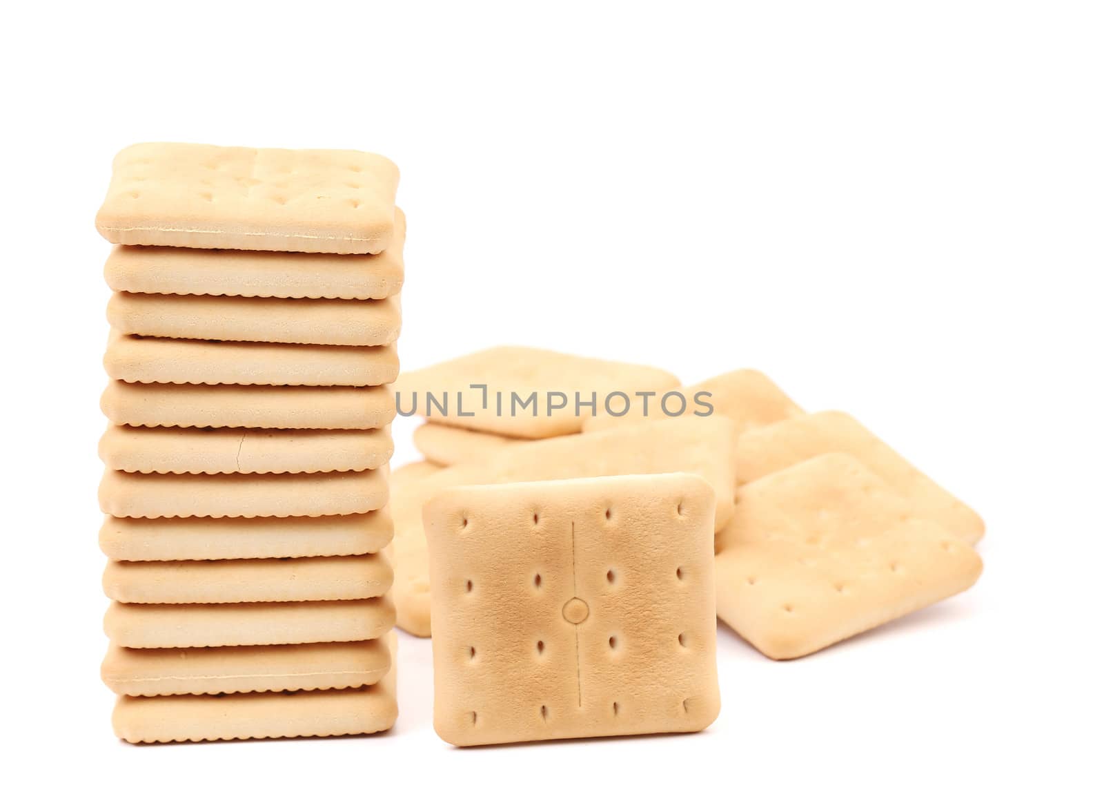 Stack saltine soda cracker. Isolated on a white background