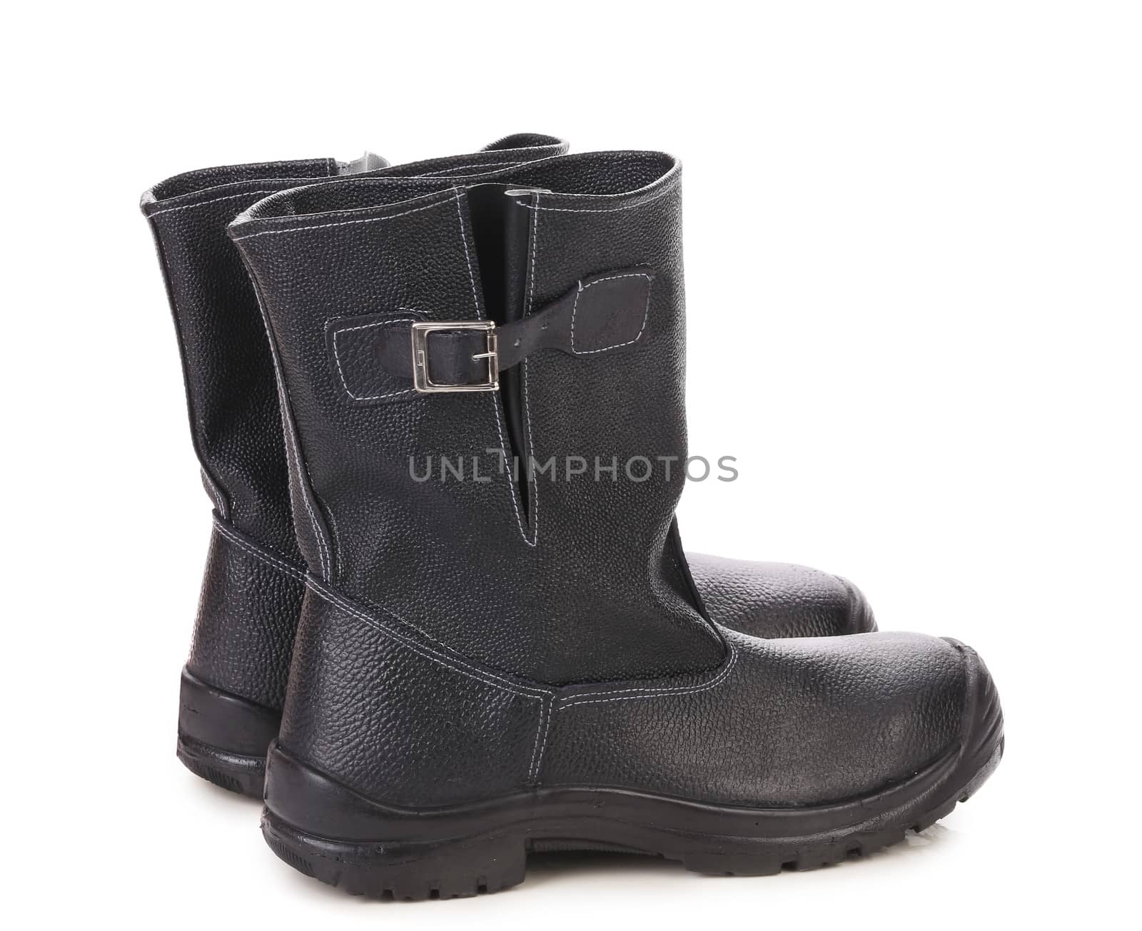 Black leather high boots. Isolated on a white background.
