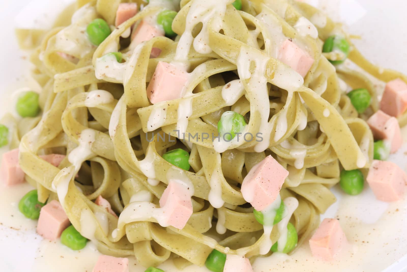 Pasta with mushrooms and sauce. Isolated on white background.