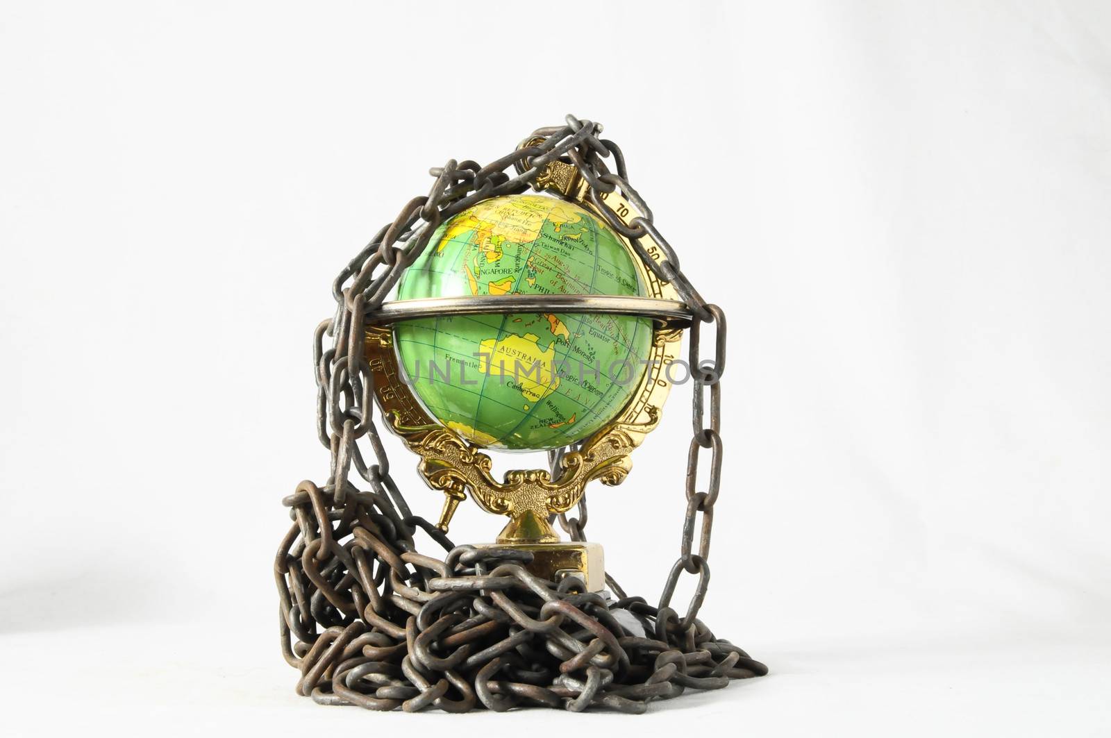 Earth globe close in chain and padlock
