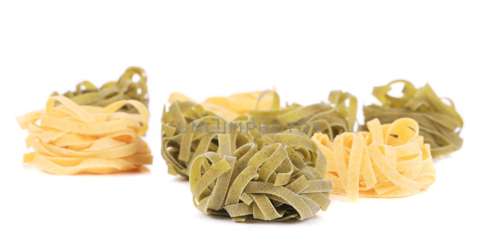 Fettucine pasta isolated. Isolated on a white background.