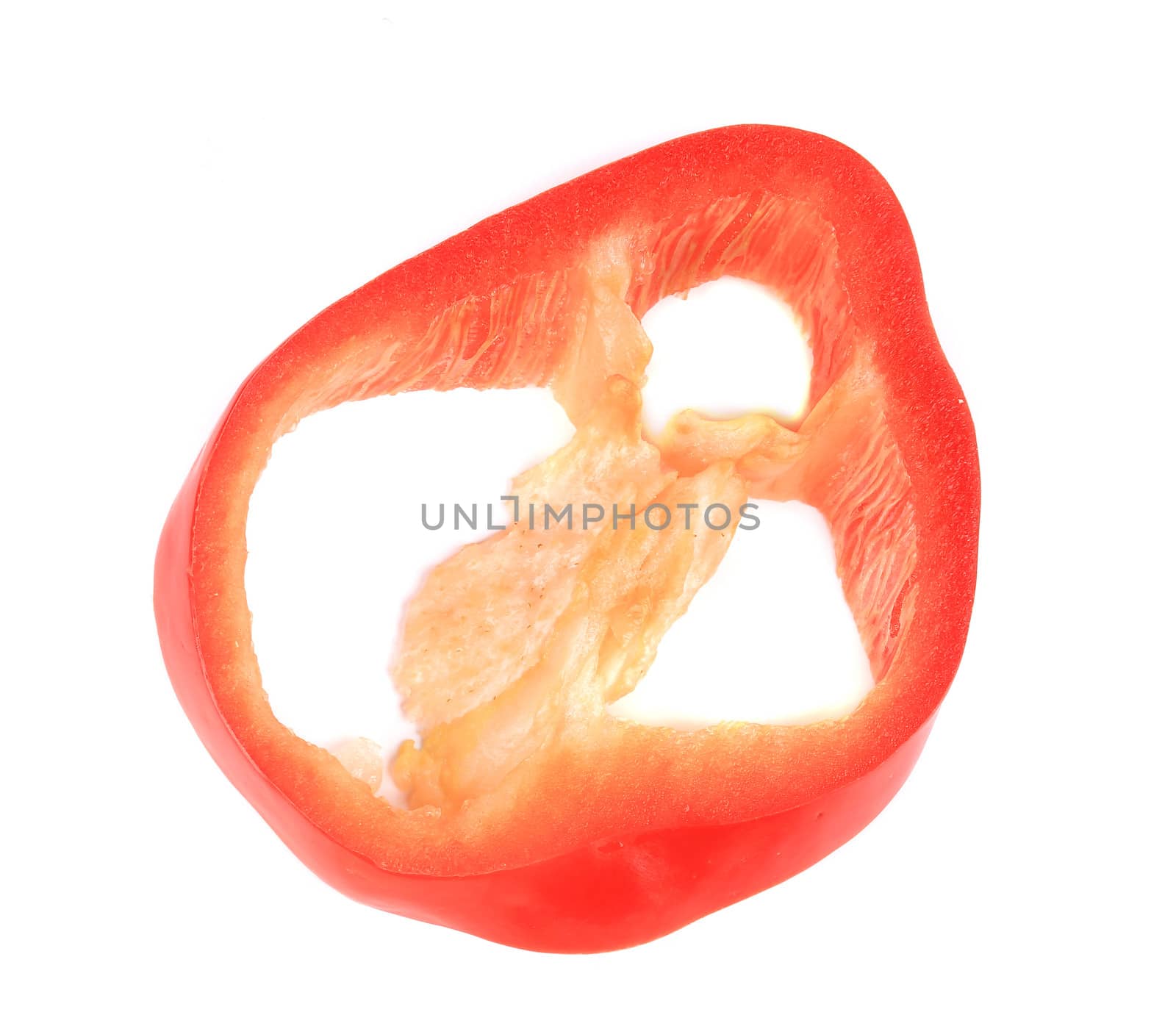 close up of red slice of pepper. isolated on a white background.