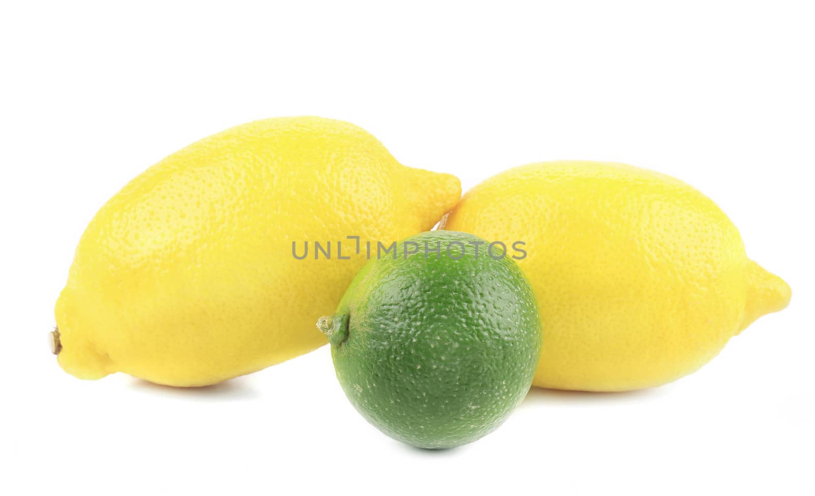 Fresh lemons and lime. Isolated on a white background.