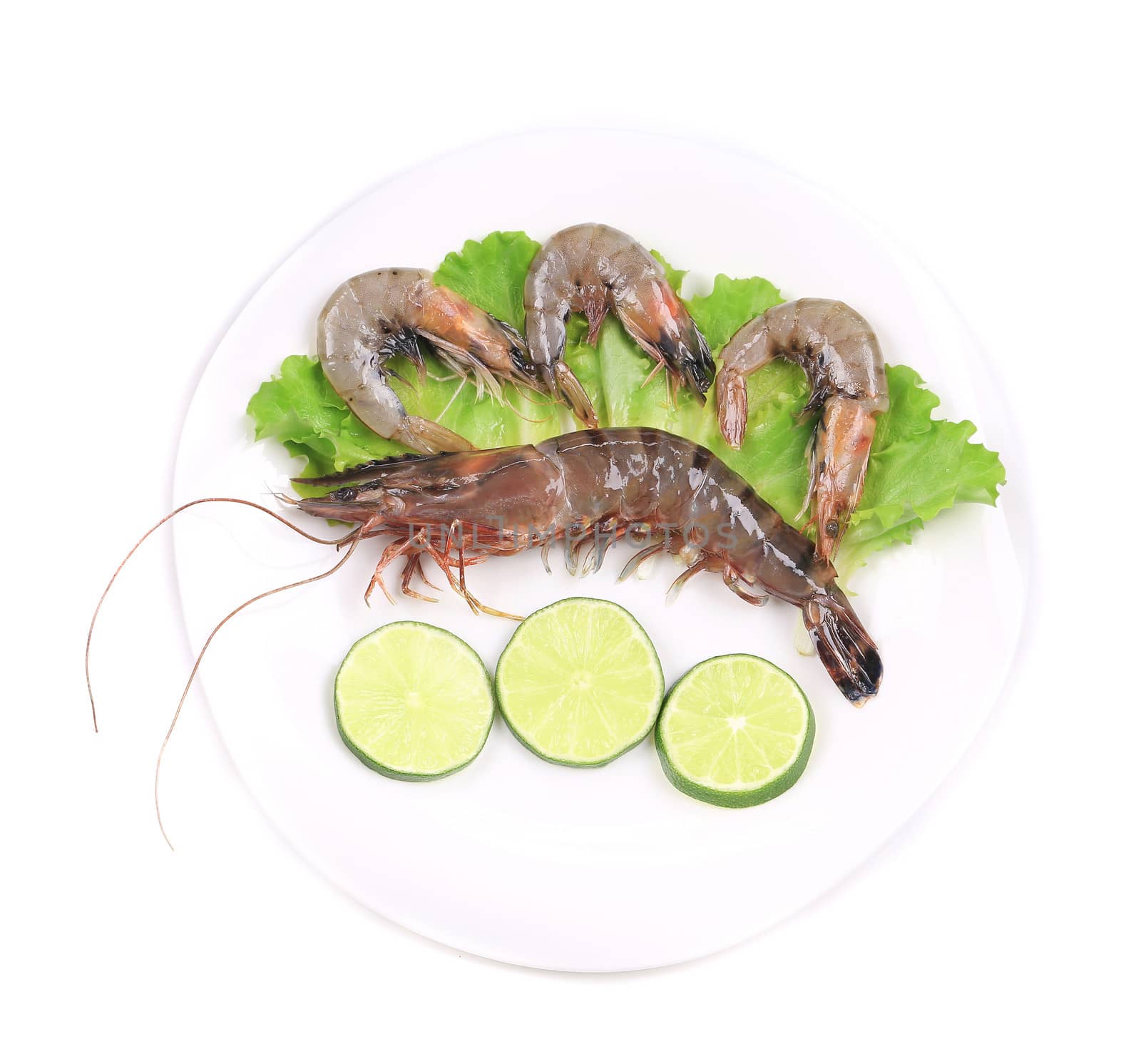 Raw shrimp on the plate. Isolated on a white background.