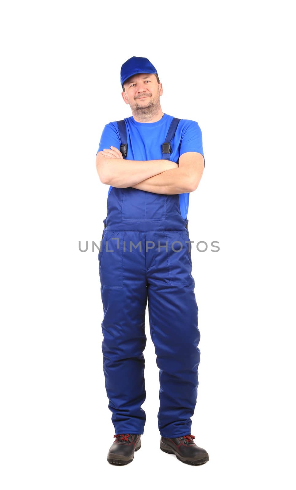 Smiling man in overall. Isolated on a white background.