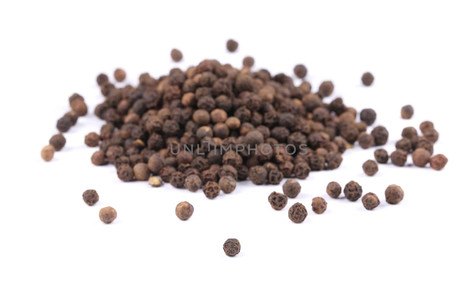 Black pepper. Isolated on a white background.